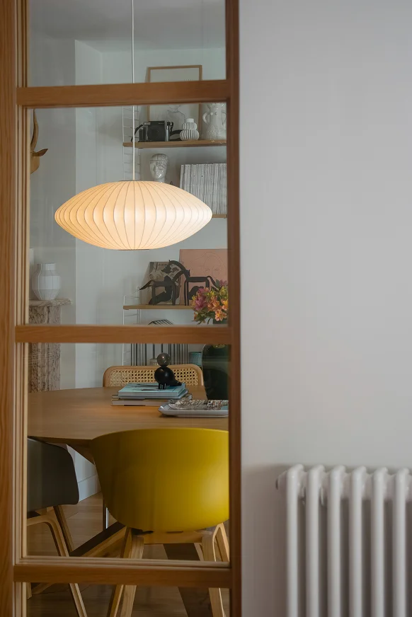 Sinpar Studio — Vista comedor a traves de puerta cristal reforma chalet Pozuelo